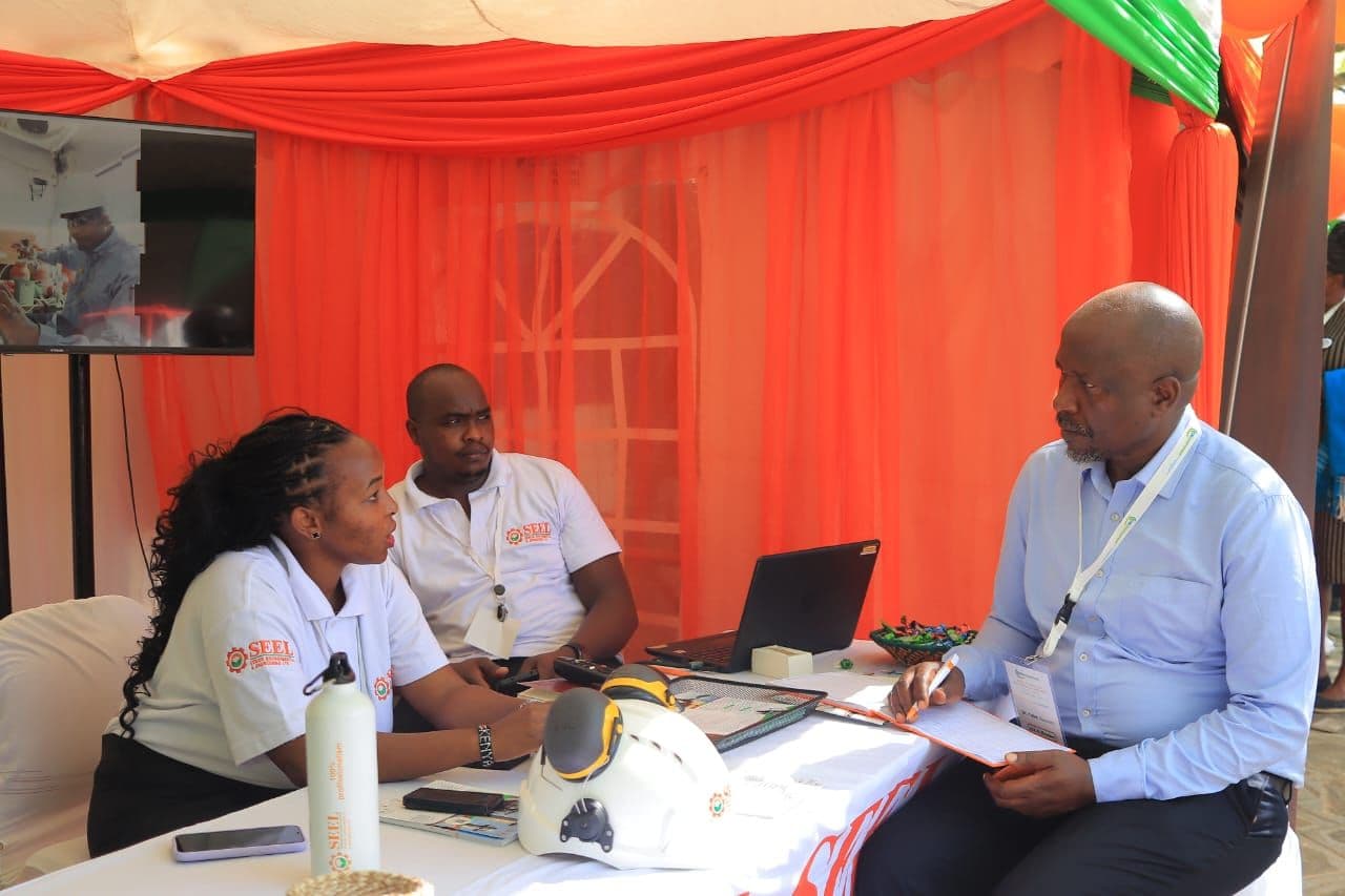 SEEL consultants meeting a visitor at the company stand